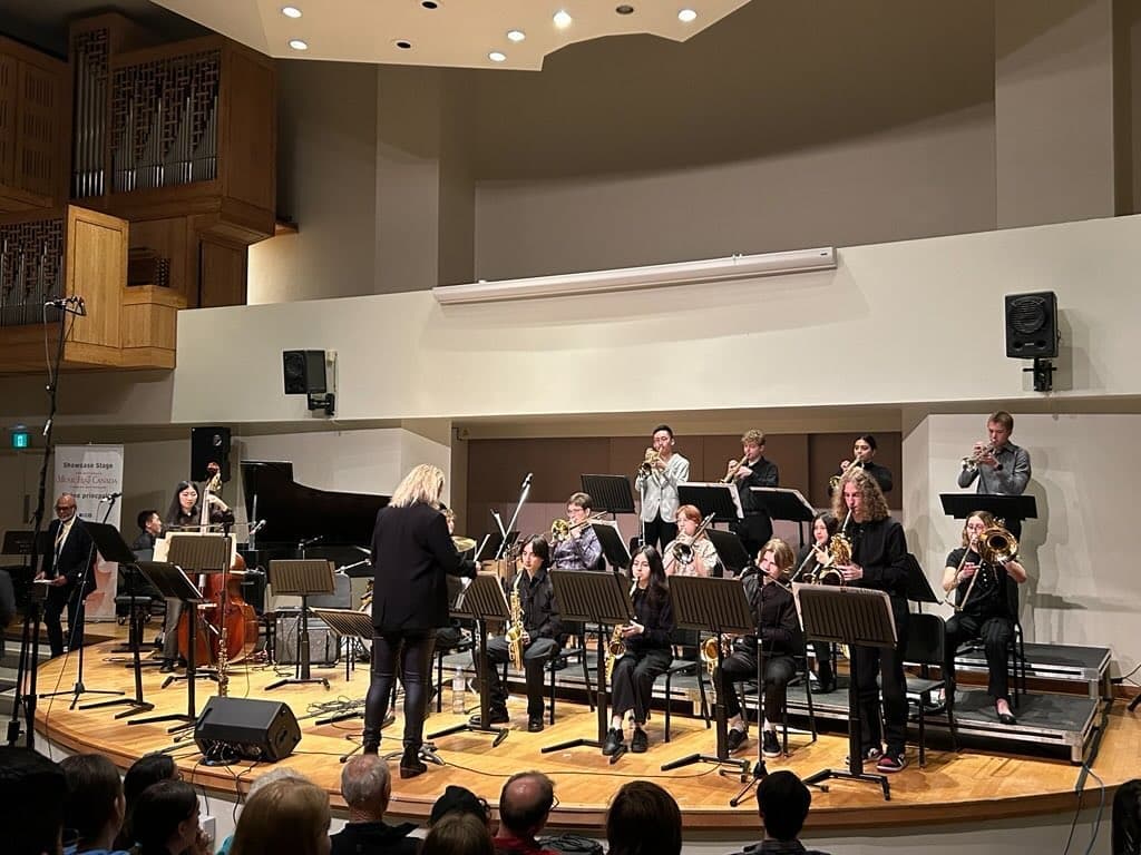 Trumpet section rehearsal in a modern hall