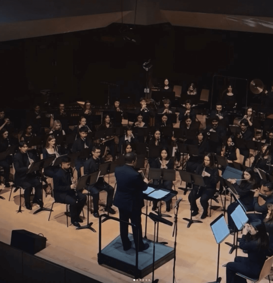 Trumpet recital on a warmly lit stage